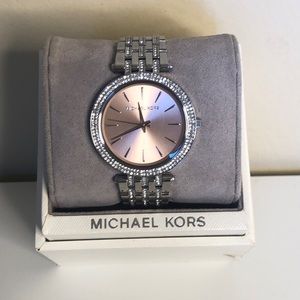 Silver *MICHAEL KORS* women’s watch